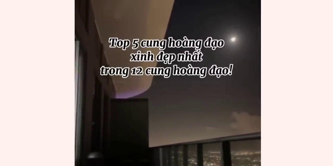 Khoảnh khắc giao thoa giữa đêm và ngày, khi bầu trời chuyển từ màu chàm sang màu cam.